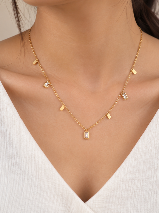 GOLD TONE STAINLESS STEEL NECKLACE WITH RECTANGULAR CRYSTAL CHARMS SN895